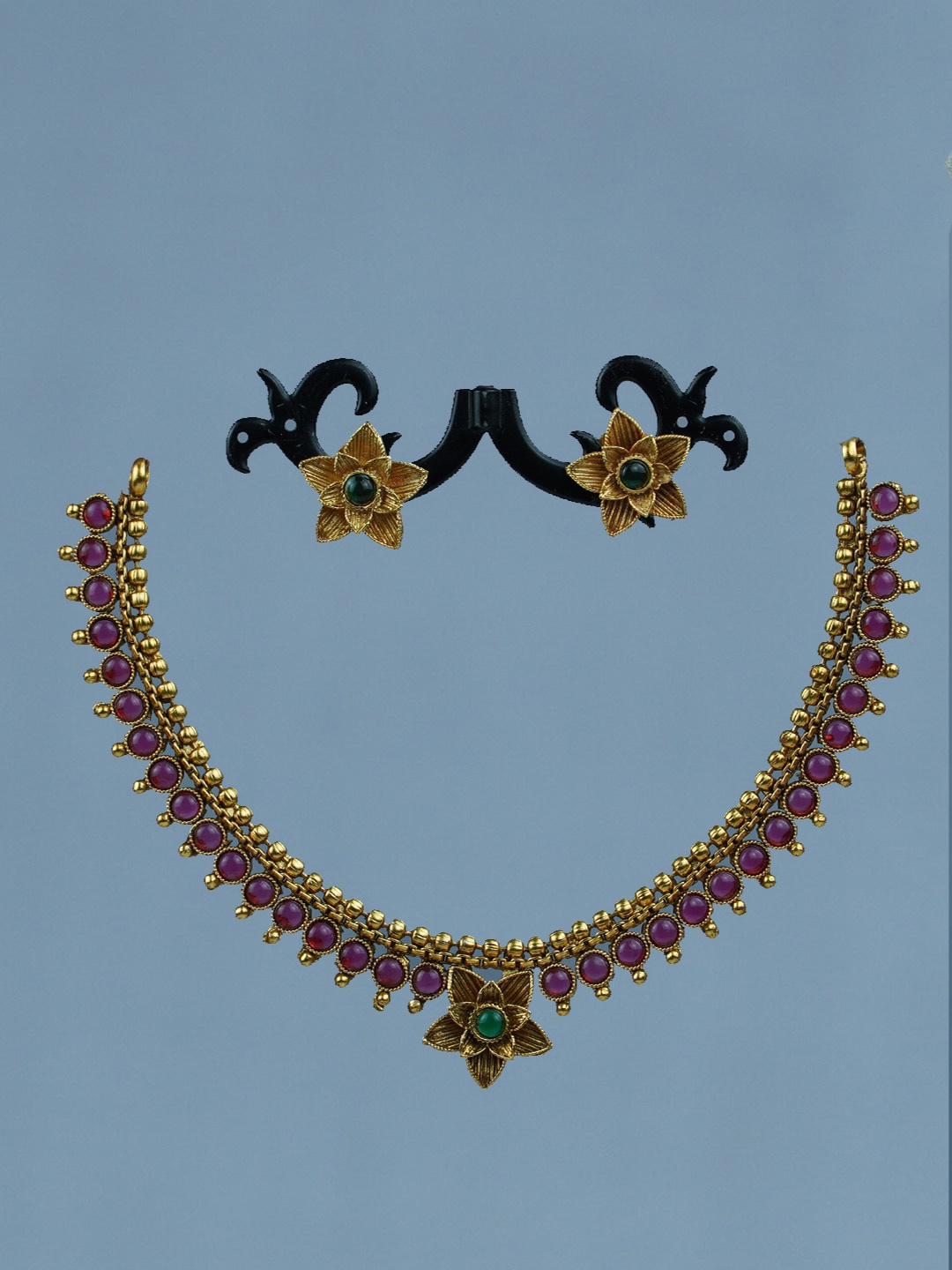 

Diksha collection Gold-Plated Stone-Studded & Pearl Beaded Matte Finish Jewellery Set