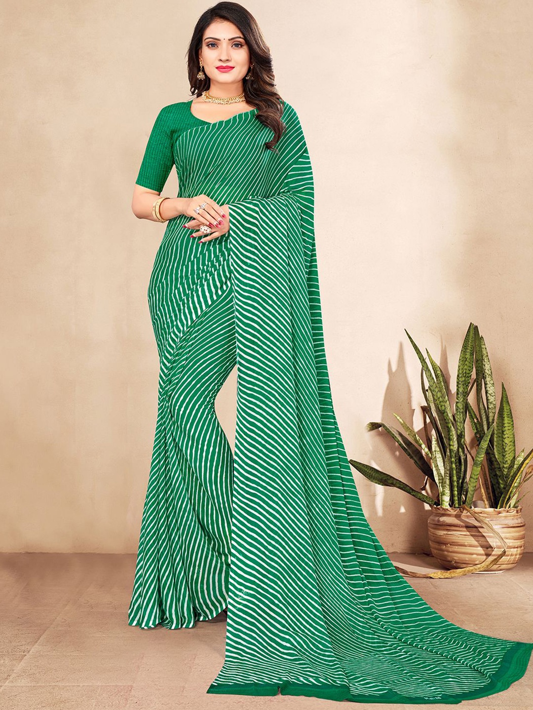 

Mitera Green & White Leheriya Poly Chiffon Saree With Blouse Piece