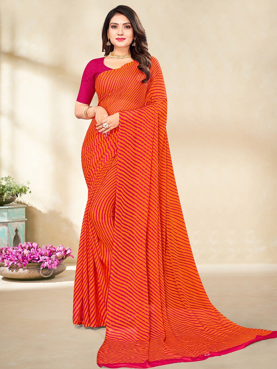 

Mitera Orange & Pink Leheriya Poly Chiffon Saree With Blouse Piece