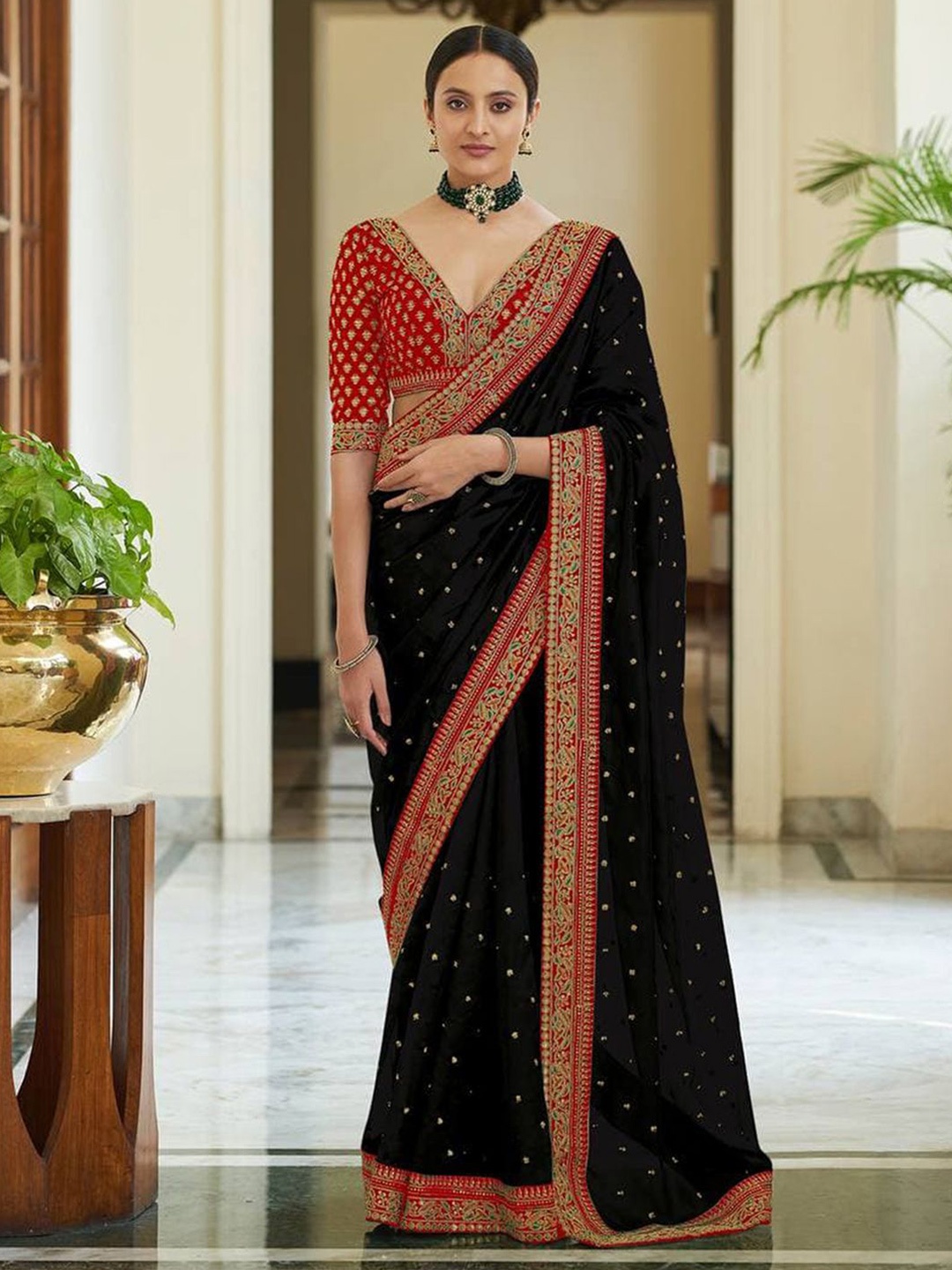 

Mitera Black & Red Embellished Embroidered Silk Blend Saree