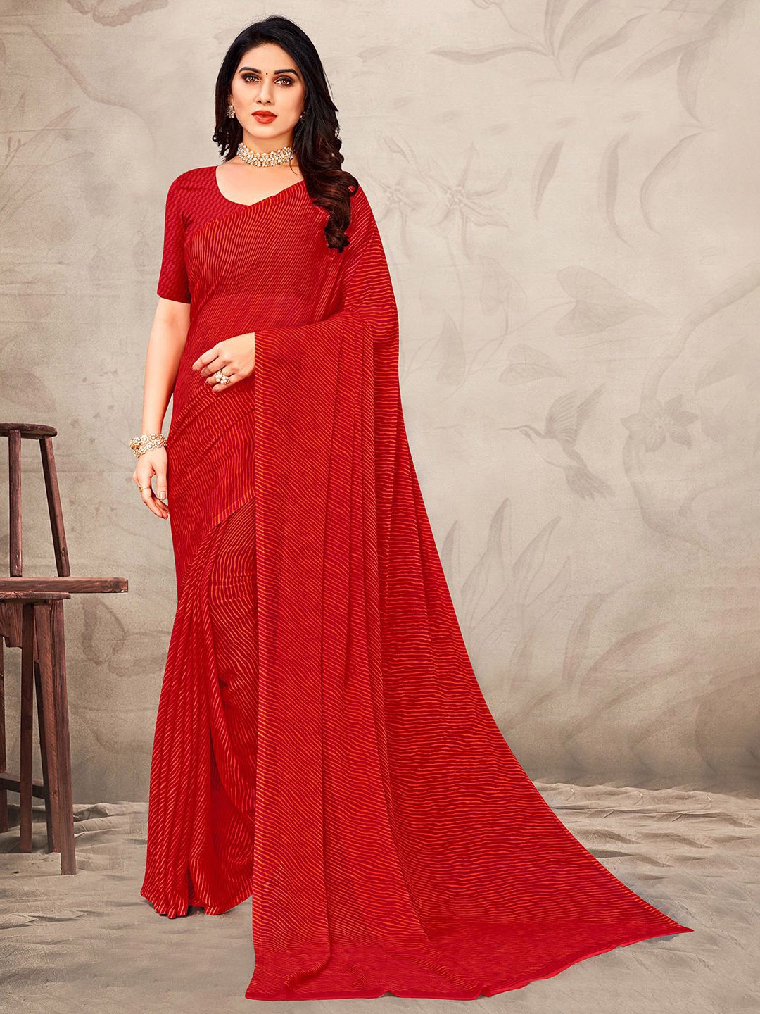 

Mitera Red & White Leheriya Poly Chiffon Saree With Blouse Piece