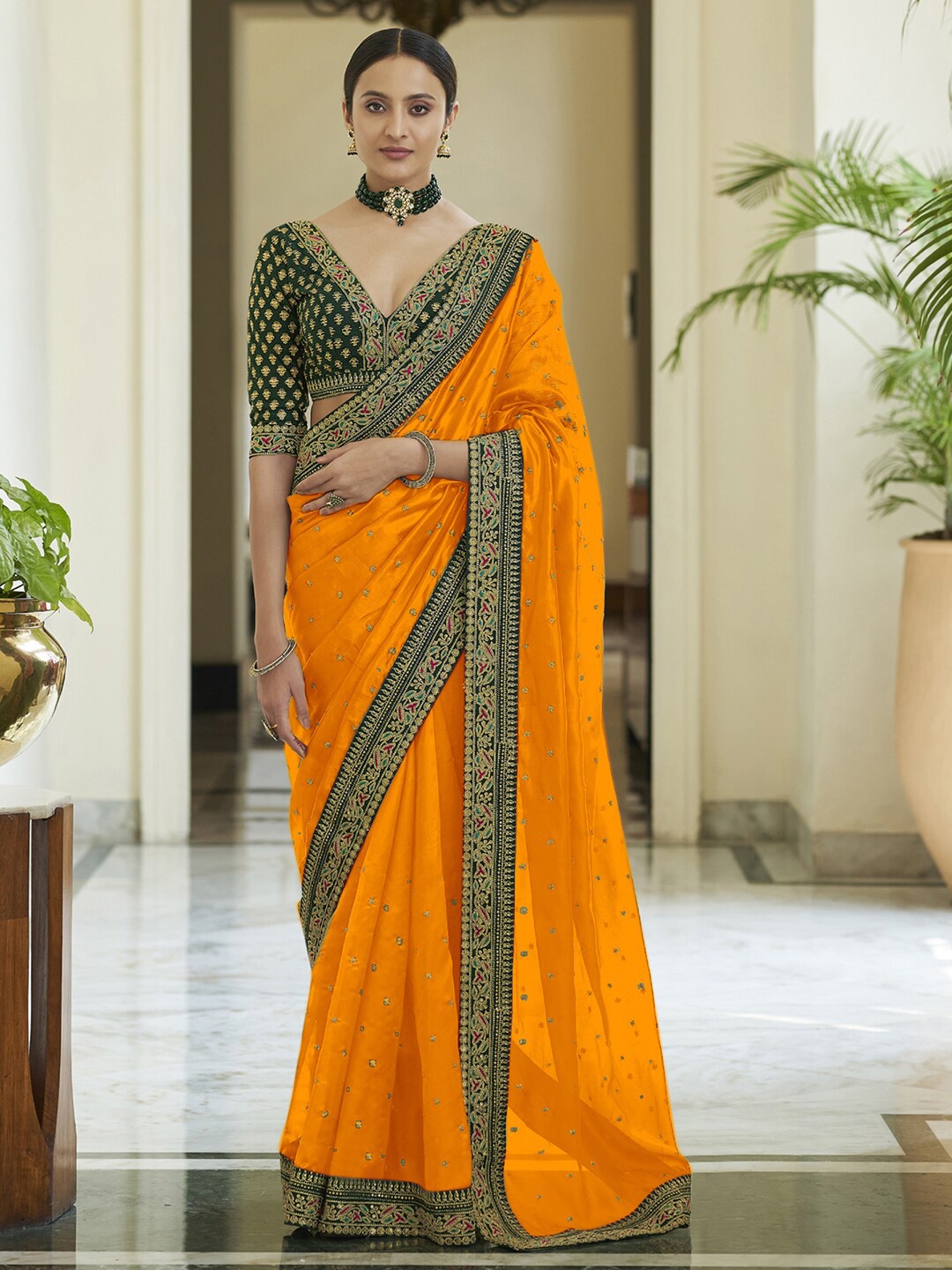 

Mitera Yellow & Green Floral Embroidered Saree