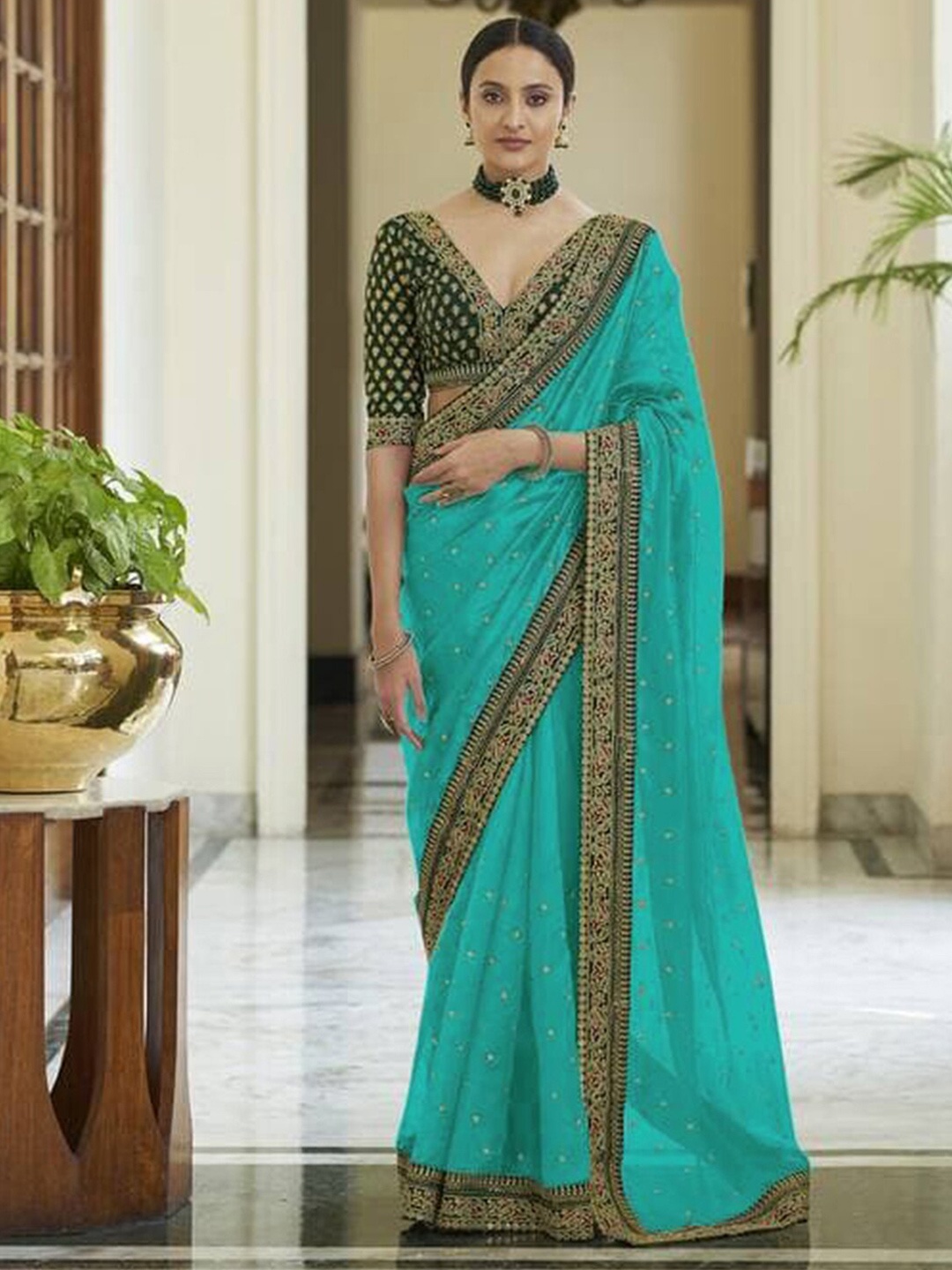 

Mitera Turquoise Blue & Green Embellished Embroidered Silk Blend Saree