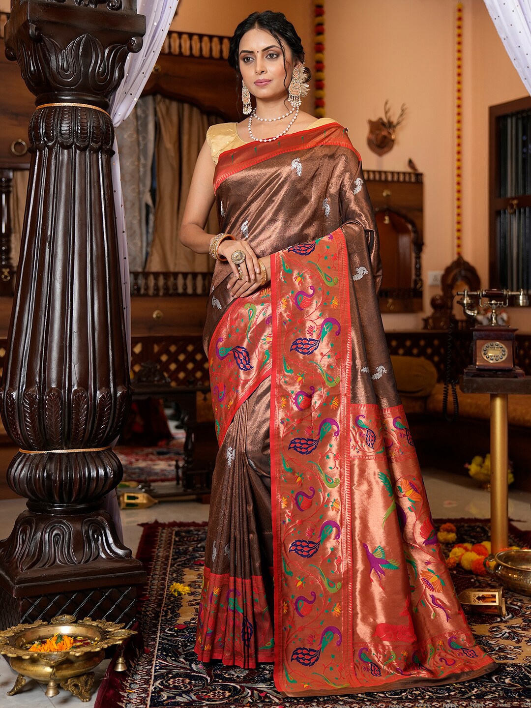 

Mitera Brown & Red Ethnic Motifs Woven Design Zari Art Silk Saree