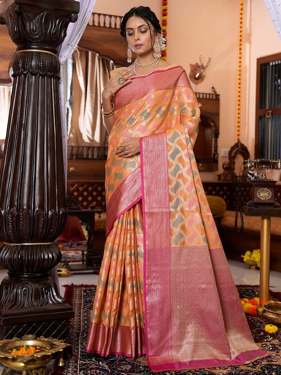 

Mitera Orange & Green Ethnic Motif Zari Silk Cotton Saree