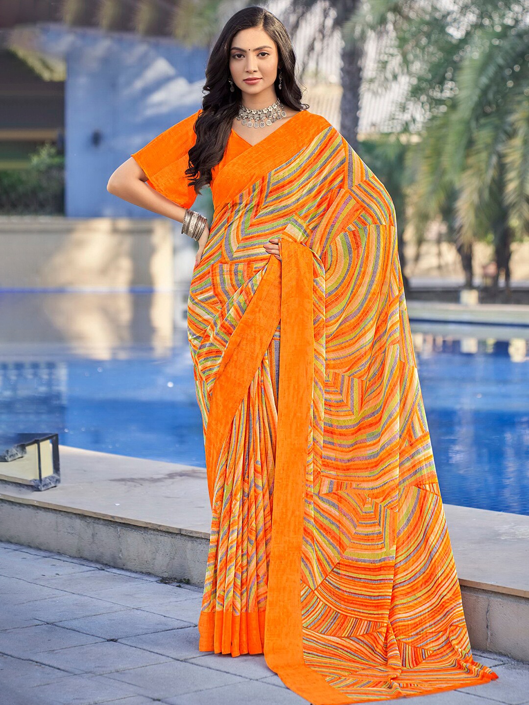 

Mitera Orange Abstract Poly Chiffon Saree With Blouse