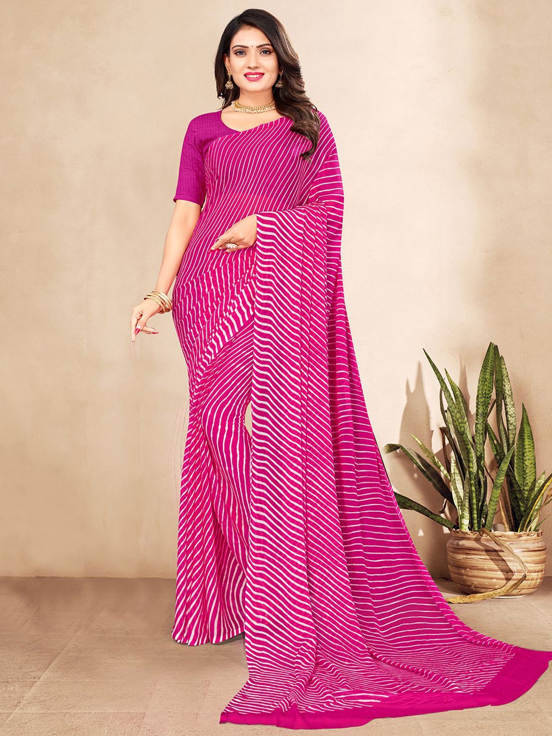 

Mitera Pink & White Leheriya Poly Chiffon Saree With Blouse Piece
