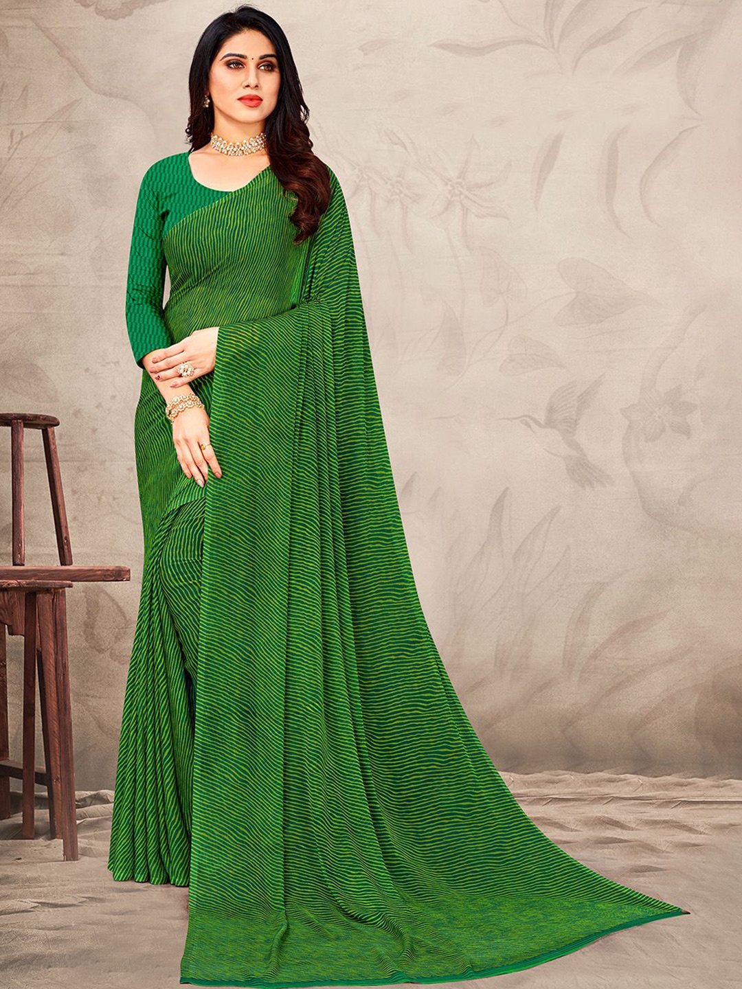 

Mitera Green Leheriya Poly Chiffon Saree With Blouse Piece