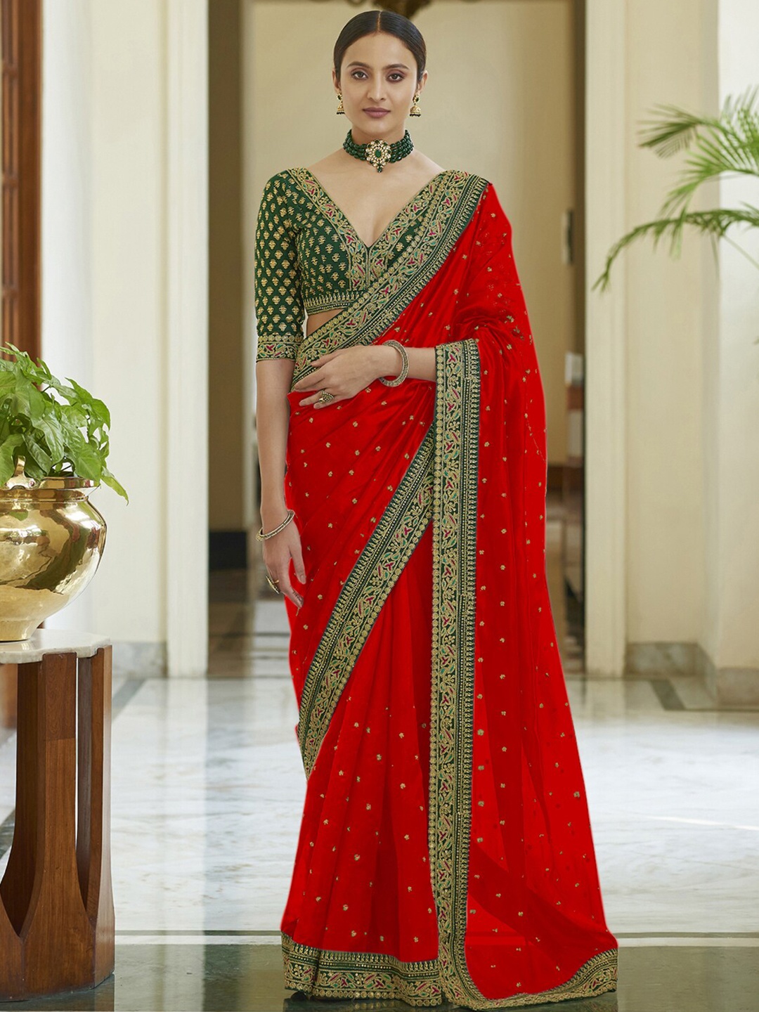 

Mitera Red & Green Embellished Embroidered Silk Blend Saree