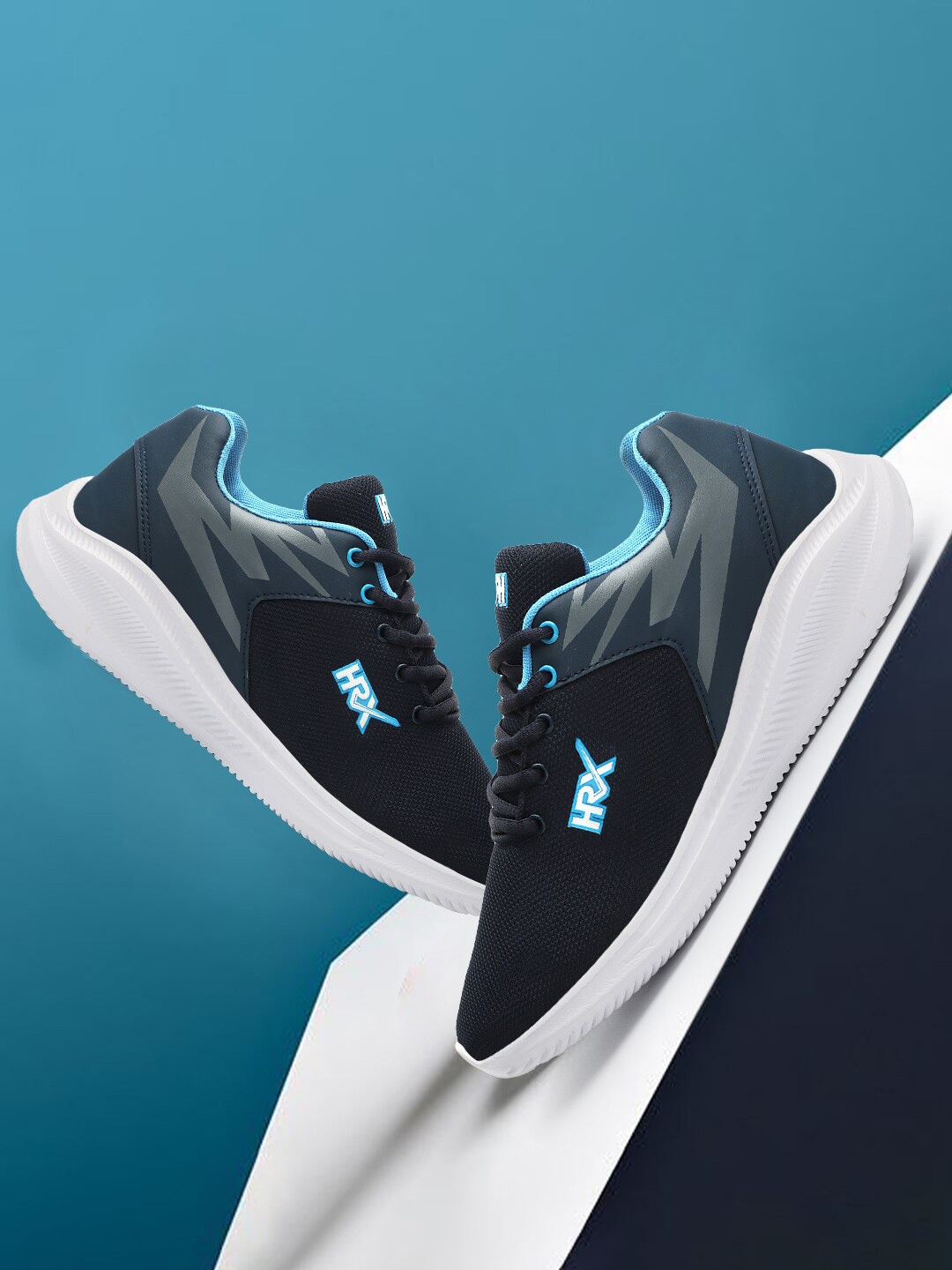 

HRX by Hrithik Roshan Men Navy Blue And White Mesh Running Sports Shoes