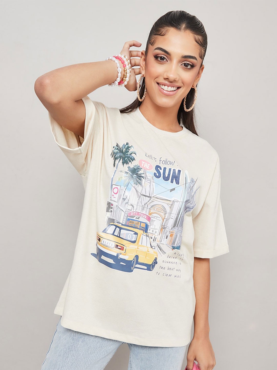 

Styli Graphic Printed Drop Shoulder Sleeves Relaxed Fit Cotton T-shirt, Cream
