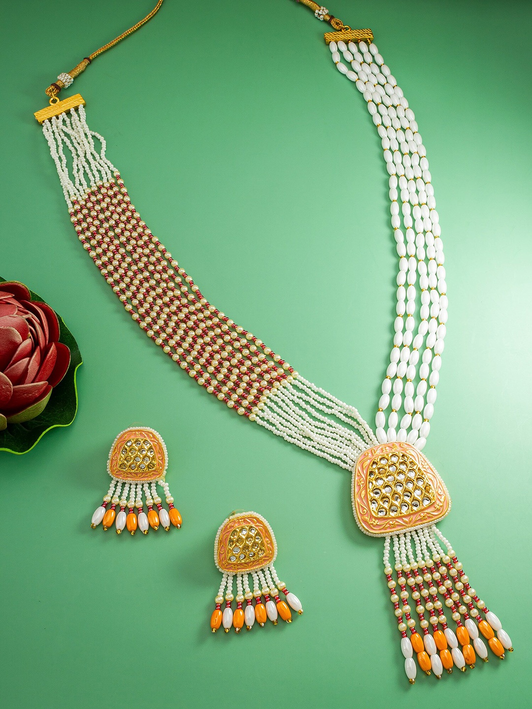 

aadita Gold-Plated Stone-Studded & Beaded Jewellery Set