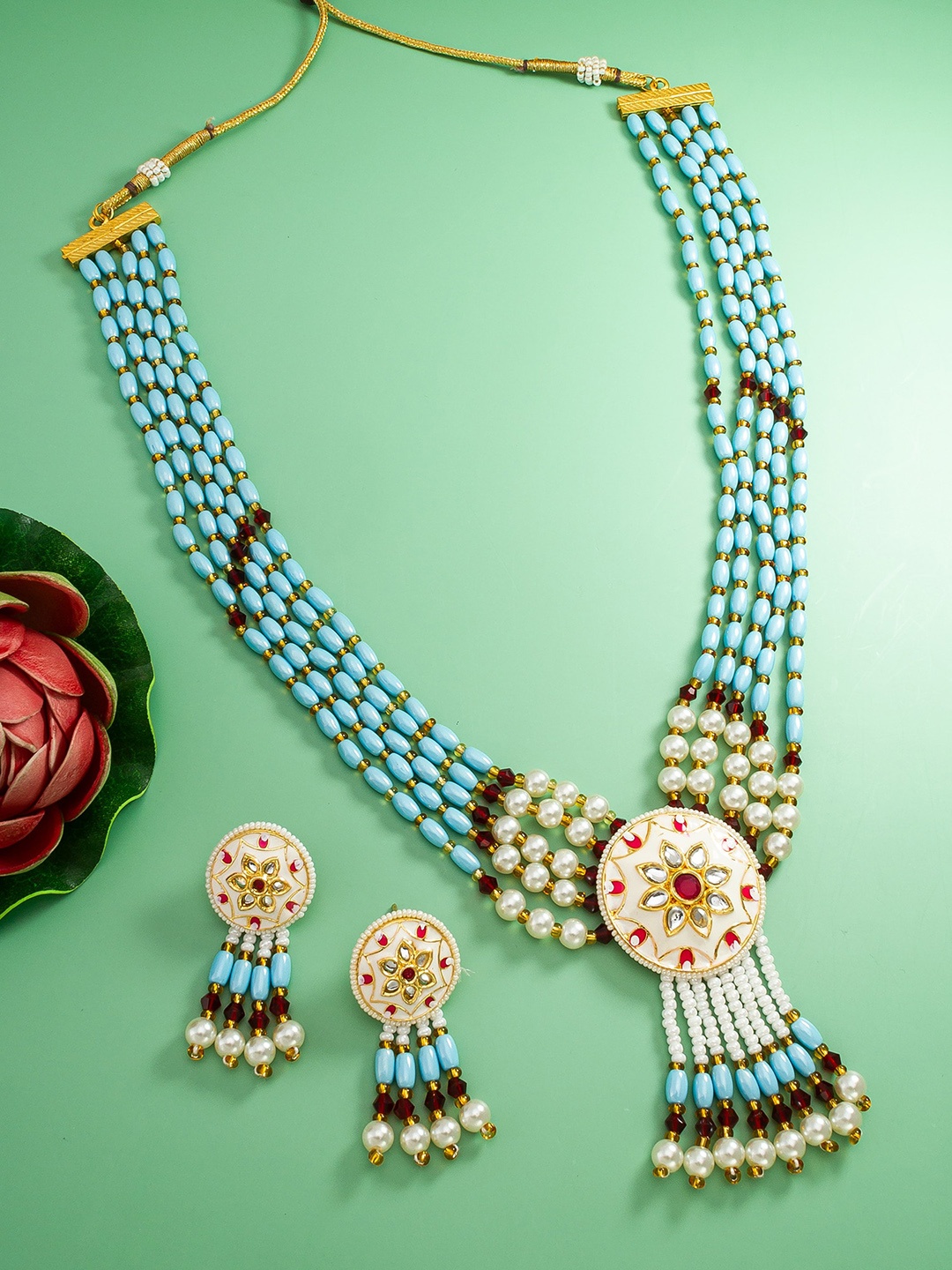

aadita Gold-Plated Stone-Studded & Beaded Jewellery Set