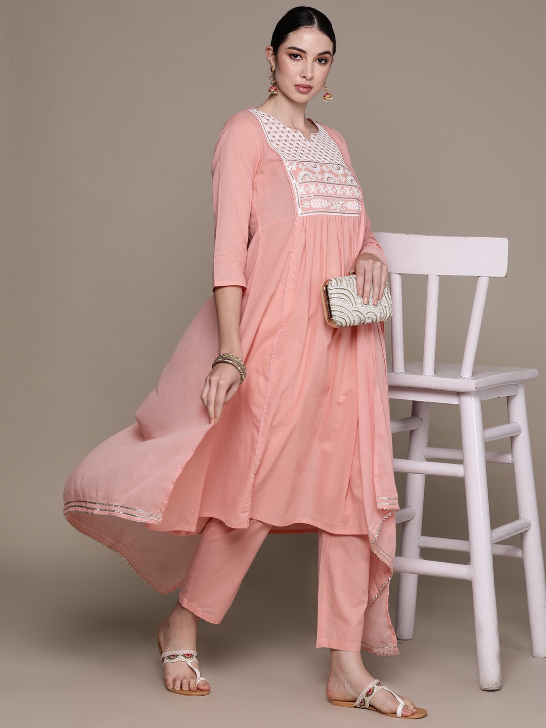 

Anubhutee Ethnic Motifs Yoke Design Pleated Thread Work Pure Cotton Kurta with Trousers, Peach