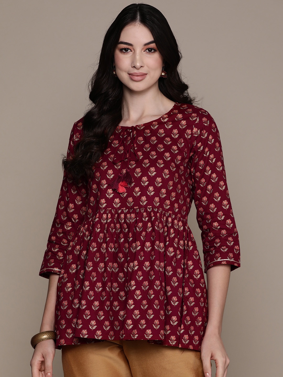 

Anubhutee Floral Printed Tie-Up Neck Pleated Kurti, Maroon