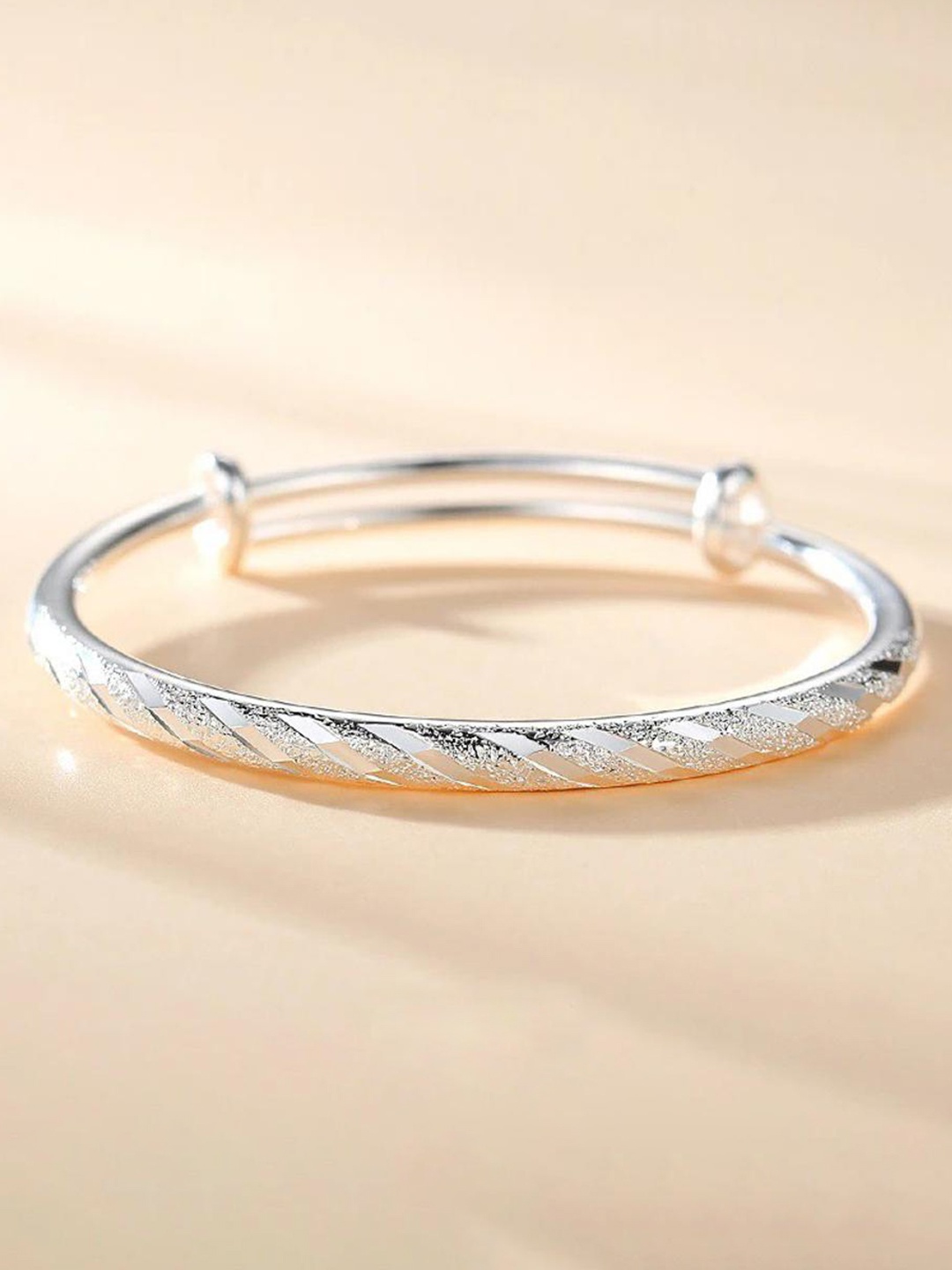 

MYKI Silver-Plated Bangle Style Bracelet