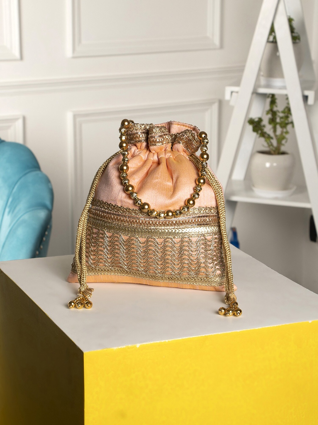 

Aditi Wasan Embroidered Potli Clutch, Peach