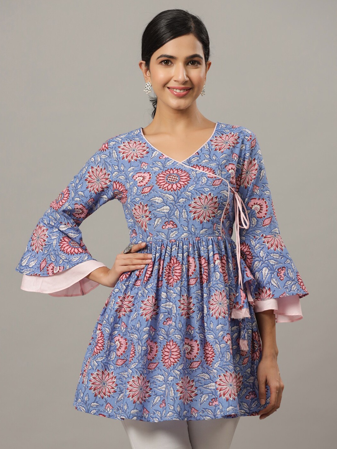 

Indian Virasat Blue Floral Print Bell Sleeve Cotton Empire Longline Top