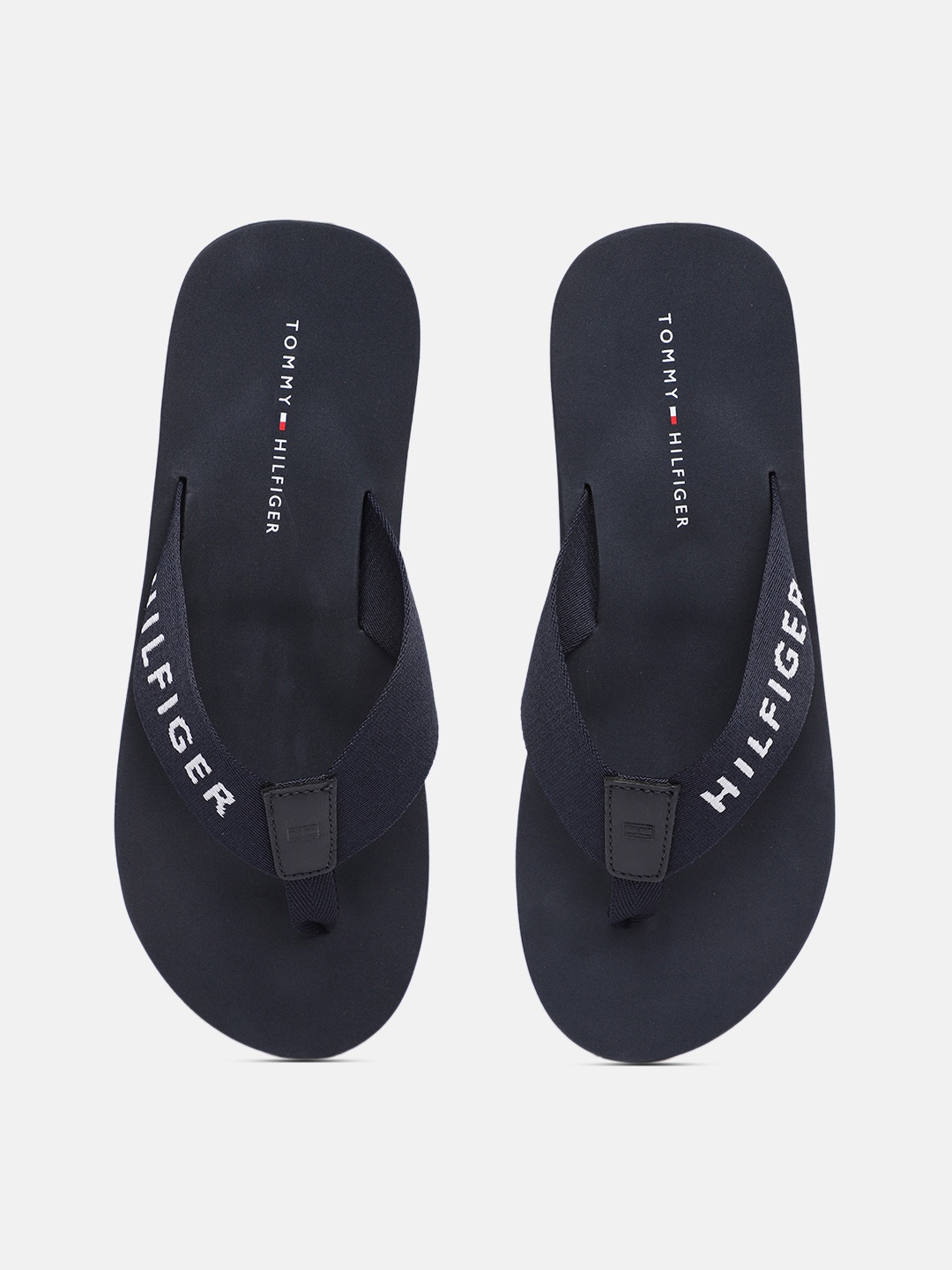 

Tommy Hilfiger Men Brand Logo Printed Thong Flip-Flops, Navy blue