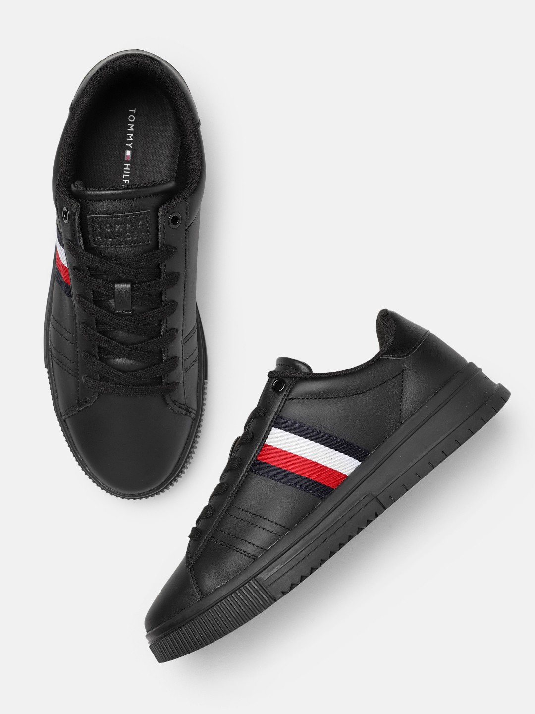 

Tommy Hilfiger Men Solid Leather Sneakers With Striped Applique Detail, Black