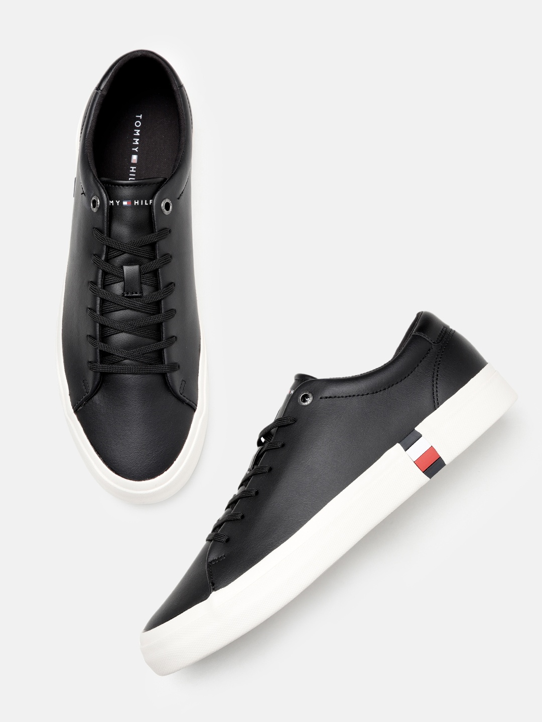 

Tommy Hilfiger Men Solid Leather Sneakers, Black