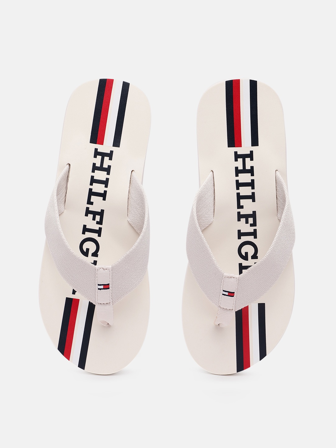 

Tommy Hilfiger Men Solid Thong Flip-Flops, White