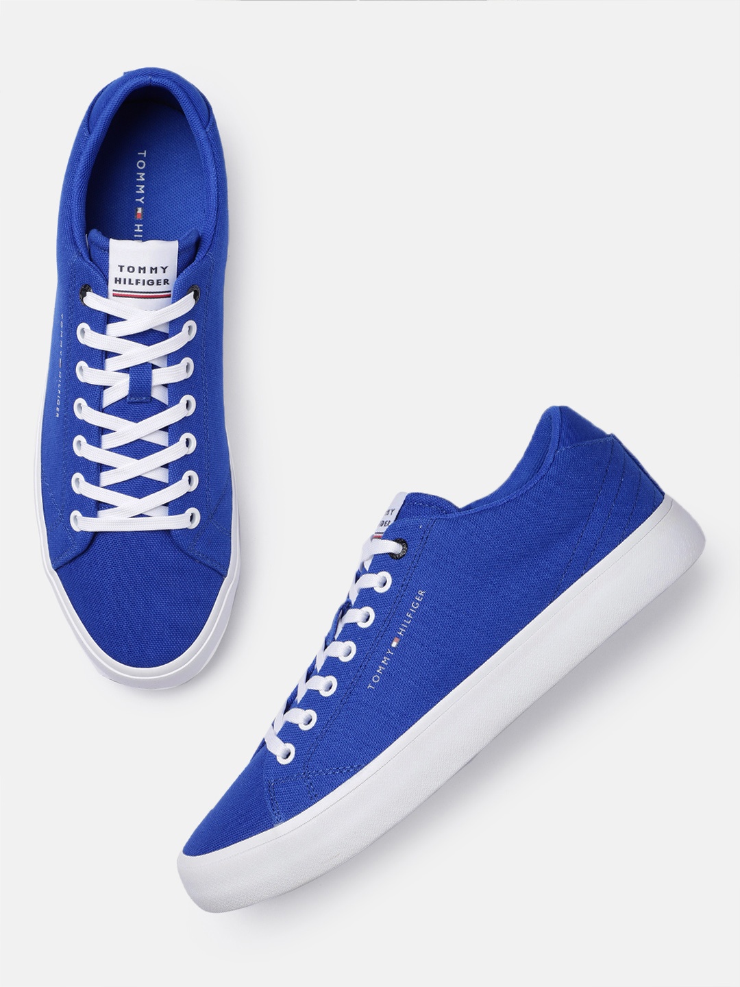 

Tommy Hilfiger Men Solid Canvas Sneakers, Blue
