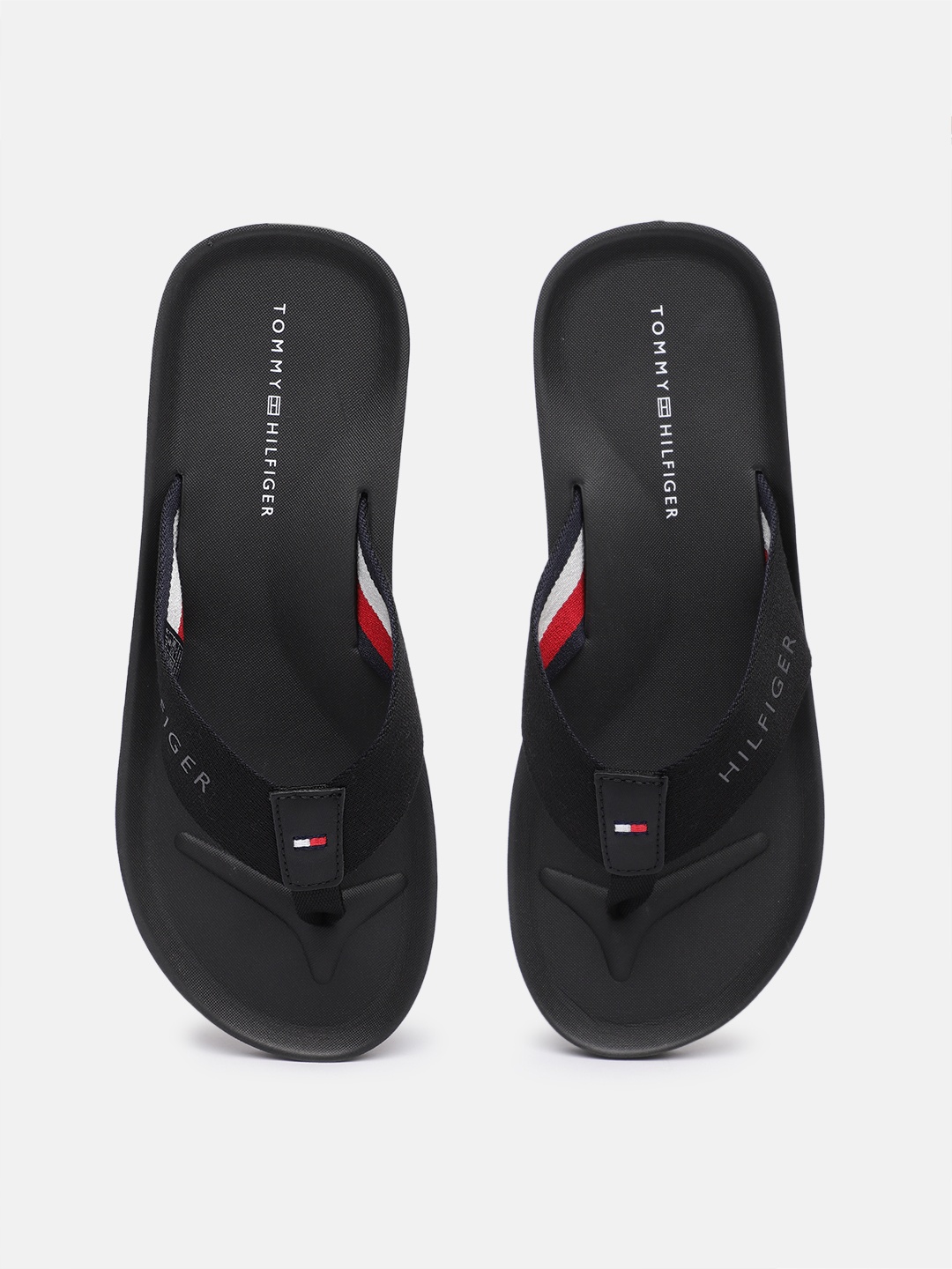 

Tommy Hilfiger Men Brand Logo Printed Thong Flip-Flops, Black