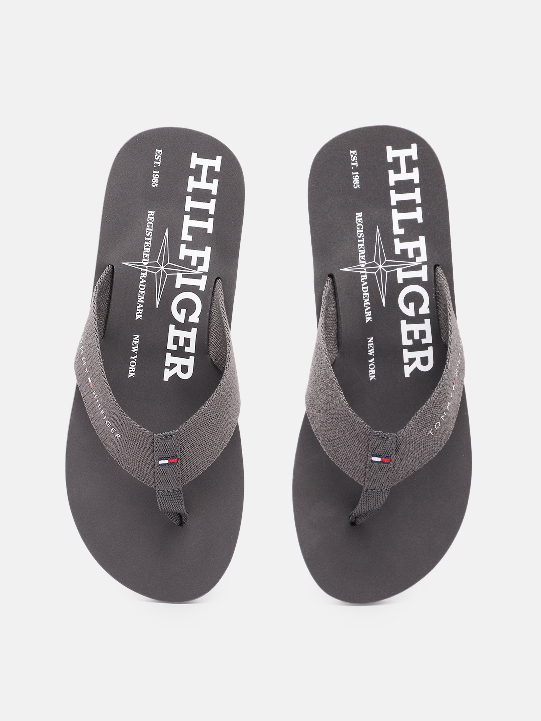 

Tommy Hilfiger Men Brand Logo Printed Thong Flip-Flops, Grey