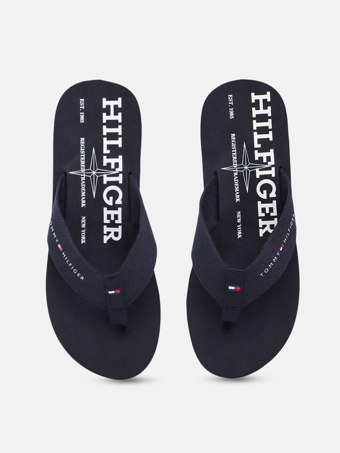 

Tommy Hilfiger Men Brand Logo Print Thong Flip-Flops, Navy blue