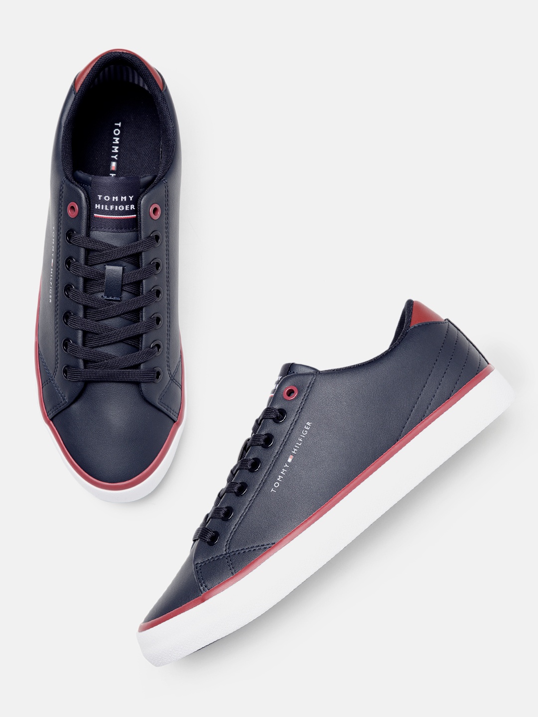 

Tommy Hilfiger Men HI Vulc Core Low Leather Solid Sneakers, Navy blue