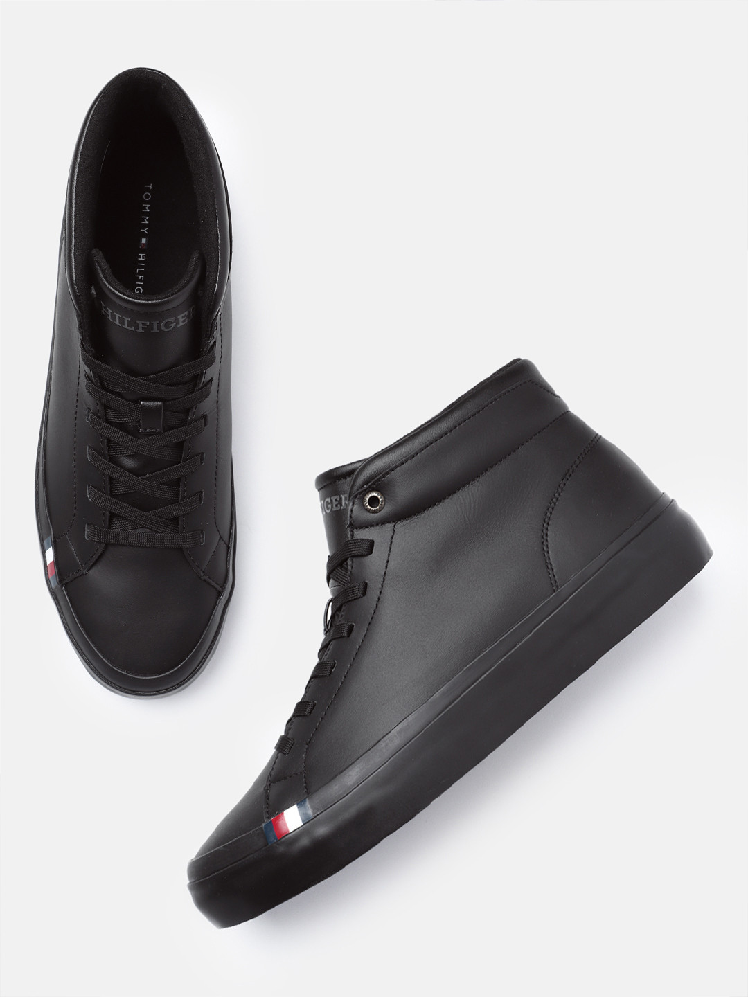 

Tommy Hilfiger Men Solid Mid-Top Leather Sneakers, Black