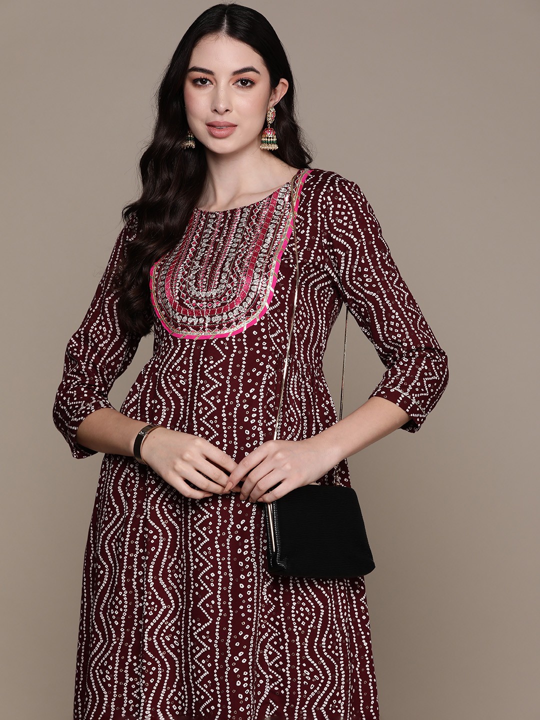 

Ishin Women Bandhani Printed Sequinned Kurta, Purple