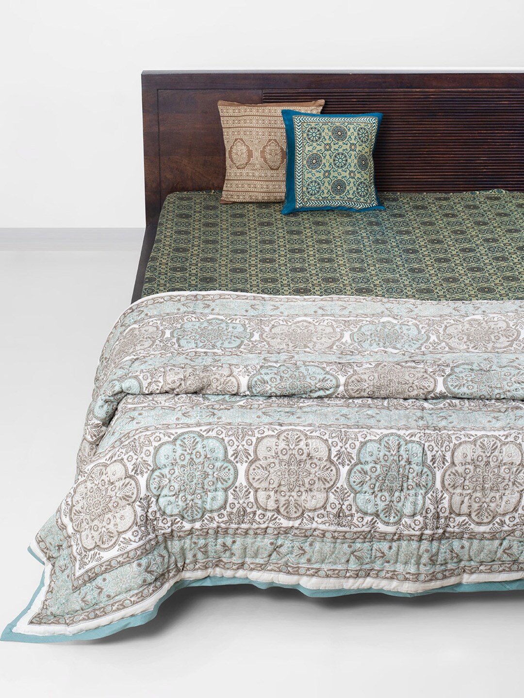 

Fabindia Suvira Teal Ethnic Motifs AC Room 350 GSM Cotton Double Bed Quilt