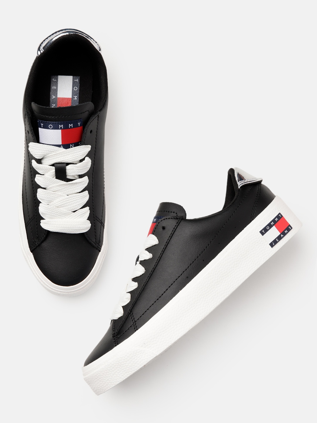 

Tommy Hilfiger Women Solid Sneakers, Black