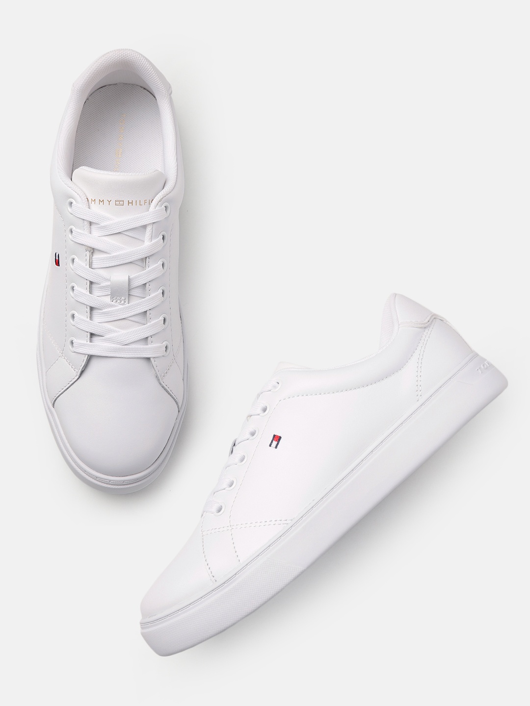 

Tommy Hilfiger Women Solid Leather Sneakers, White