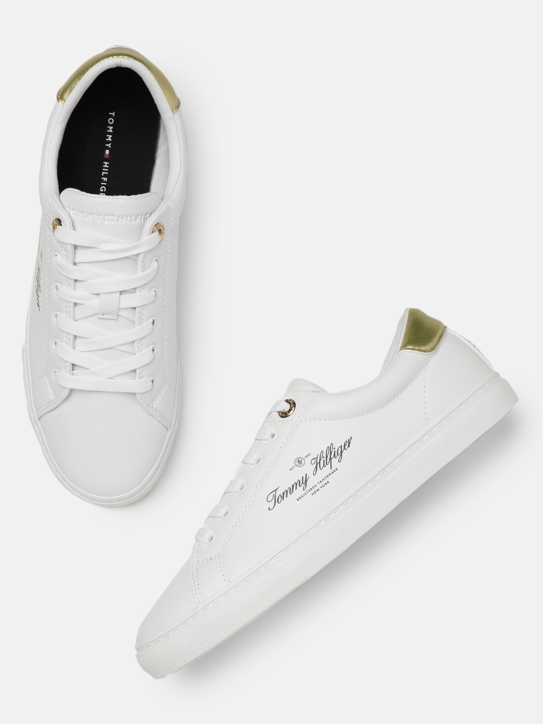 

Tommy Hilfiger Women Solid Sneakers, White