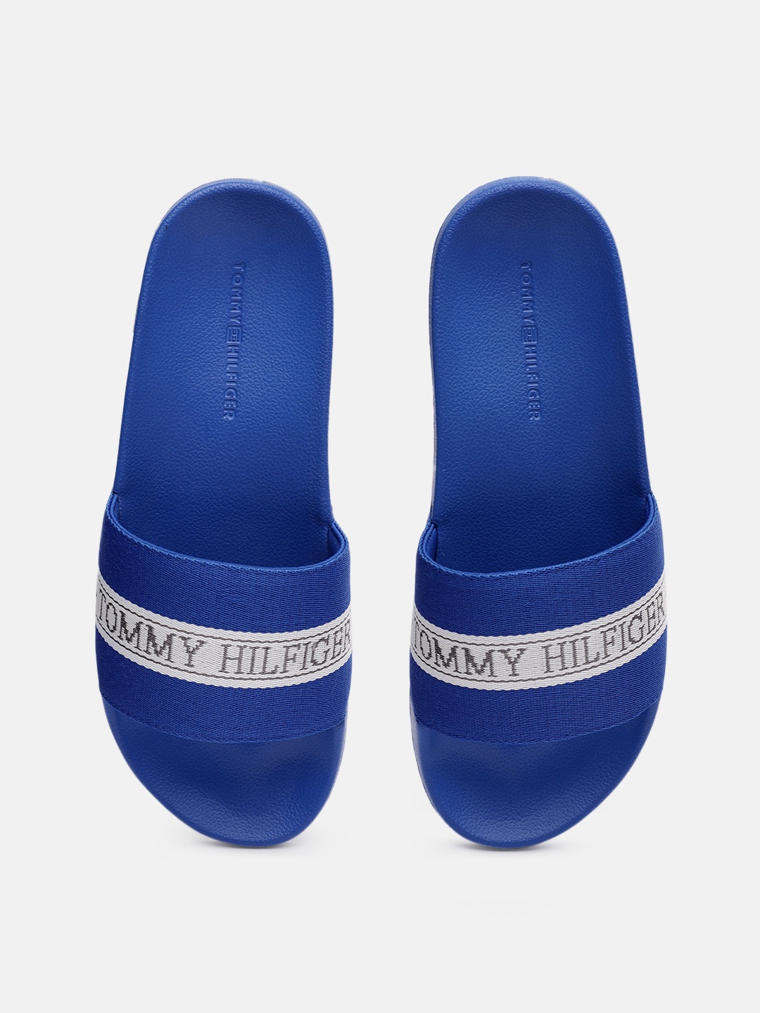 

Tommy Hilfiger Women Brand Logo Printed Sliders, Blue