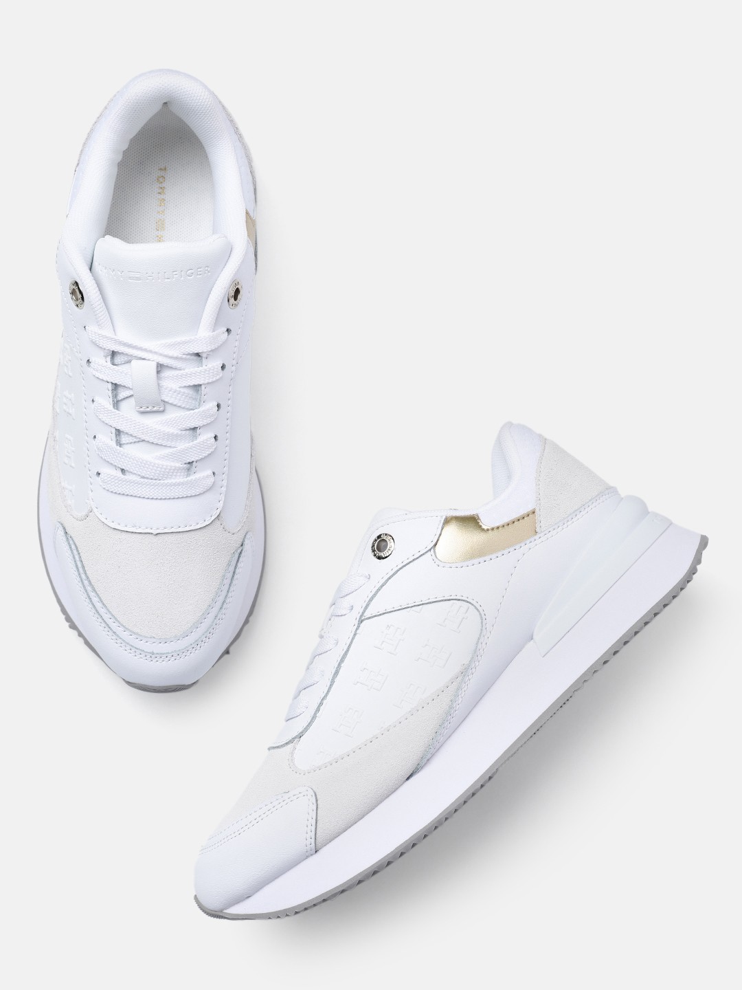 

Tommy Hilfiger Women Solid Leather Sneakers, White