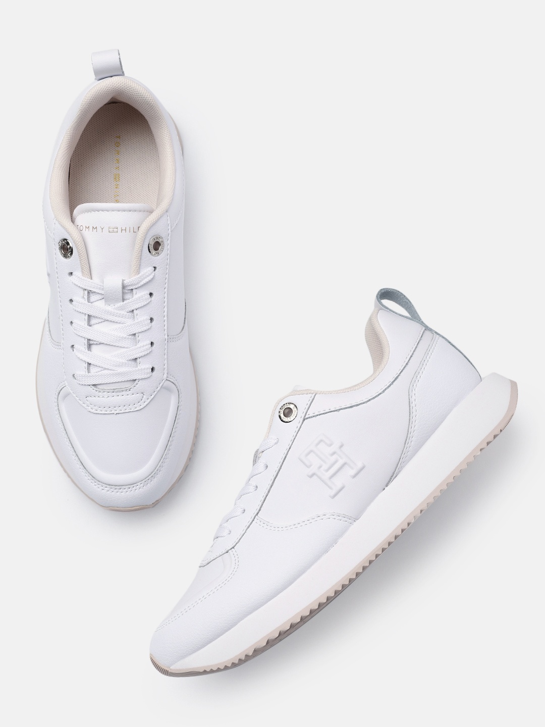 

Tommy Hilfiger Women Solid Regular Sneakers, White