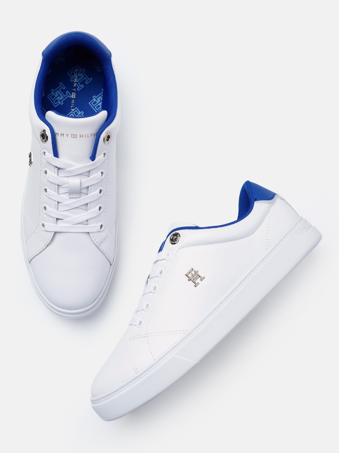 

Tommy Hilfiger Women Solid Sneakers, White