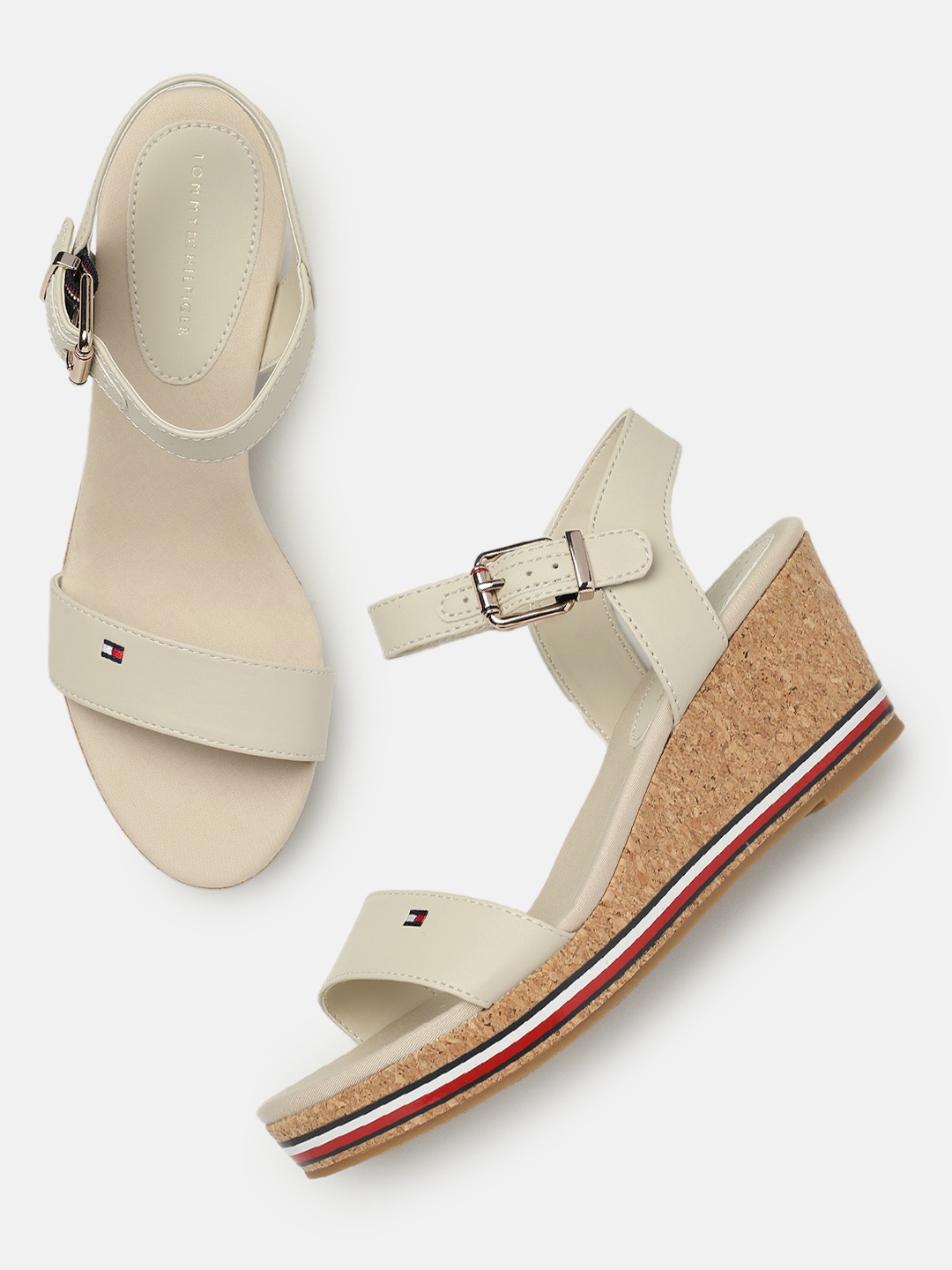 

Tommy Hilfiger Women Solid Open Toe Wedge Heels, Off white