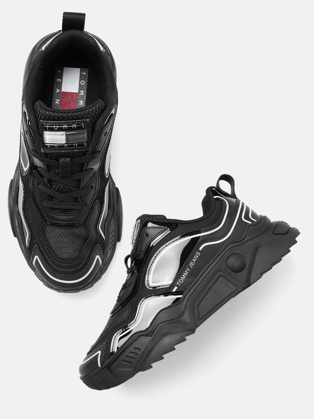 

Tommy Hilfiger Women Solid Sneakers, Black