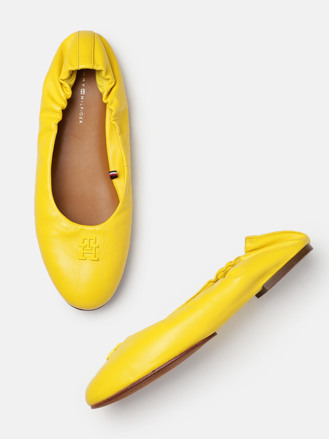 

Tommy Hilfiger Women Solid Ballerinas With Brand Logo Detail, Yellow