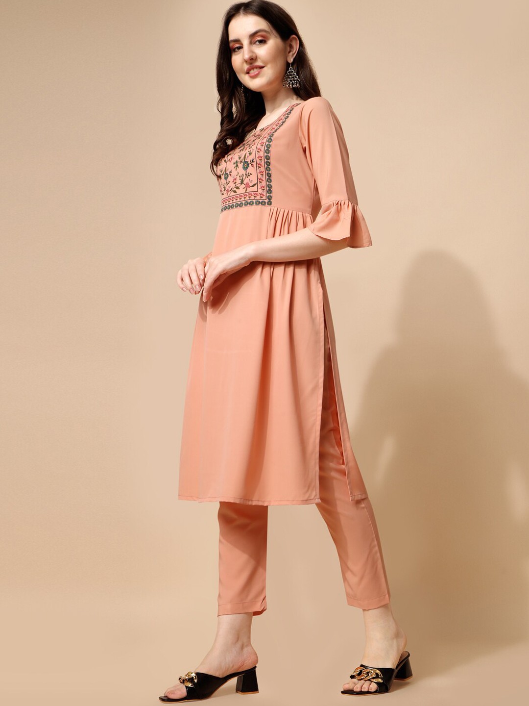 

NAINVISH Floral Embroidered Regular Bell Sleeves Kurta With Trousers, Peach