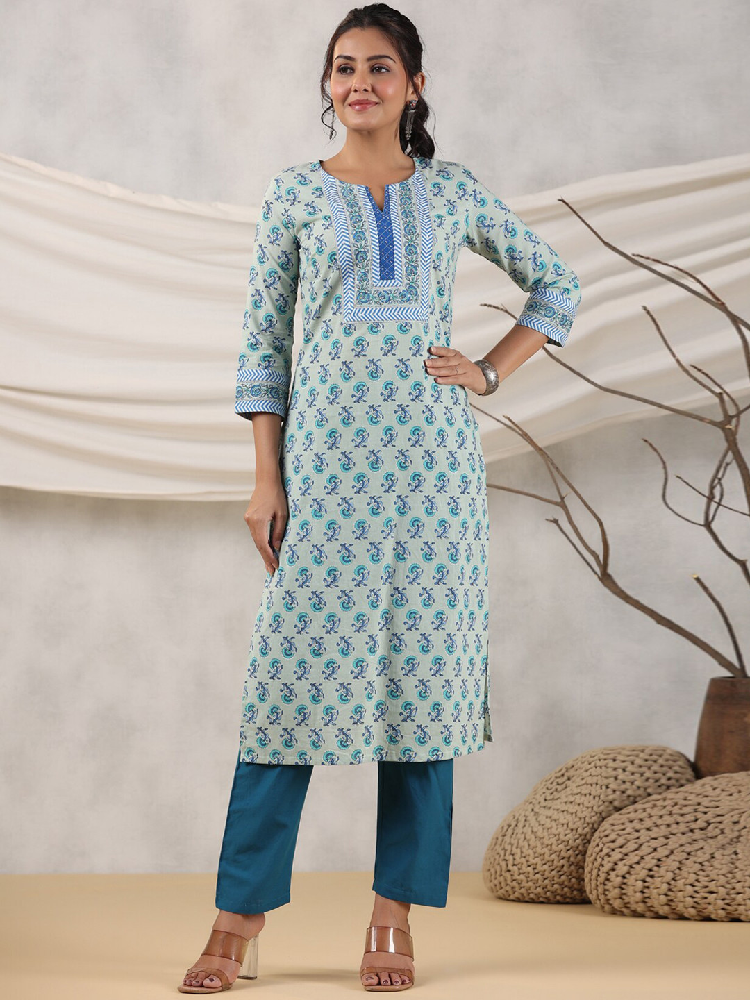 

Rain & Rainbow Floral Printed Sequined Notched Neck Kurta, Blue