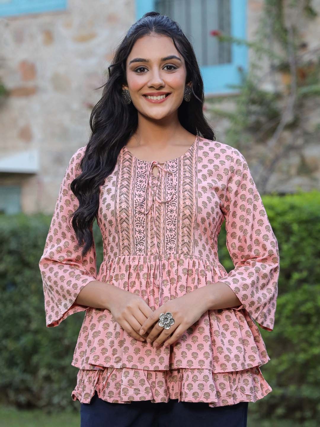 

Rain & Rainbow Ethnic Motifs Printed Tie-Up Neck Peplum Top, Peach