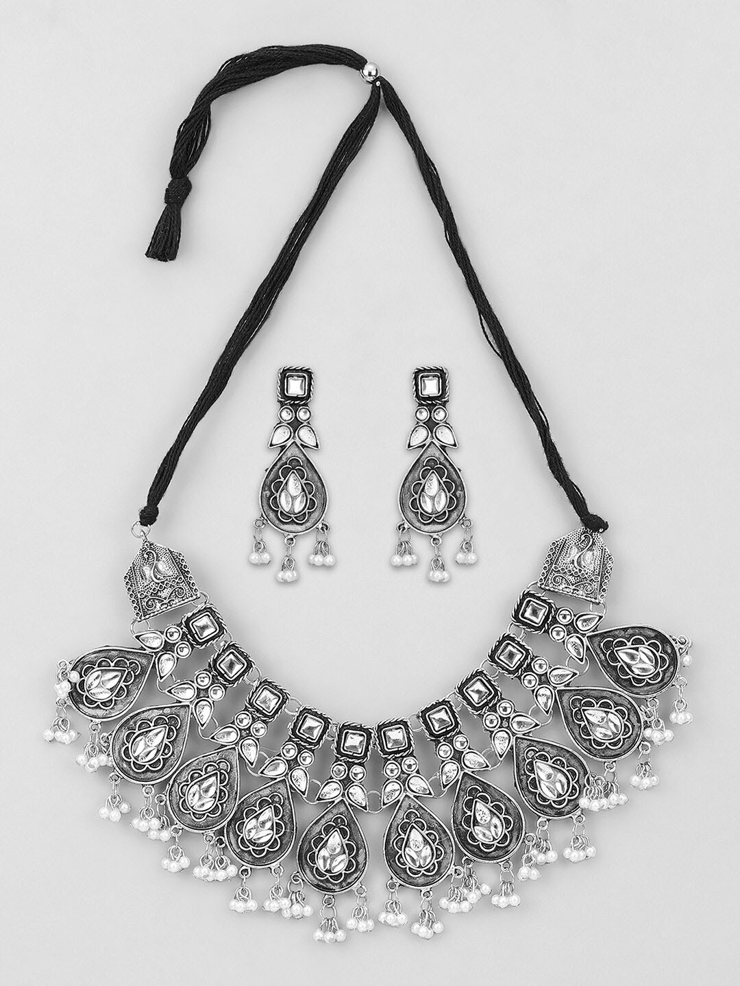 

Samridhi DC Oxidised Silver-Plated Stone Studded & Beaded Jewellery Set