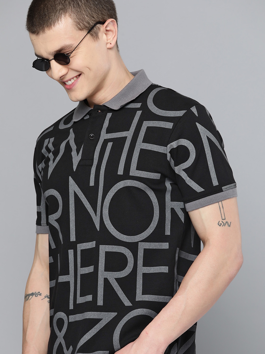 

HERE&NOW Men Typography Printed Polo Collar T-shirt, Black