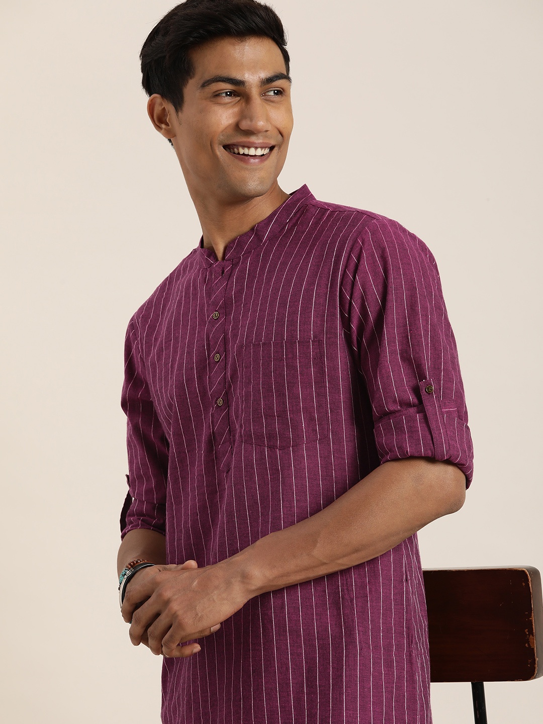 

Taavi Thread Work Striped Mandarin Collar Kurta with Trouser Nagari Weaves Kurta Sets, Magenta